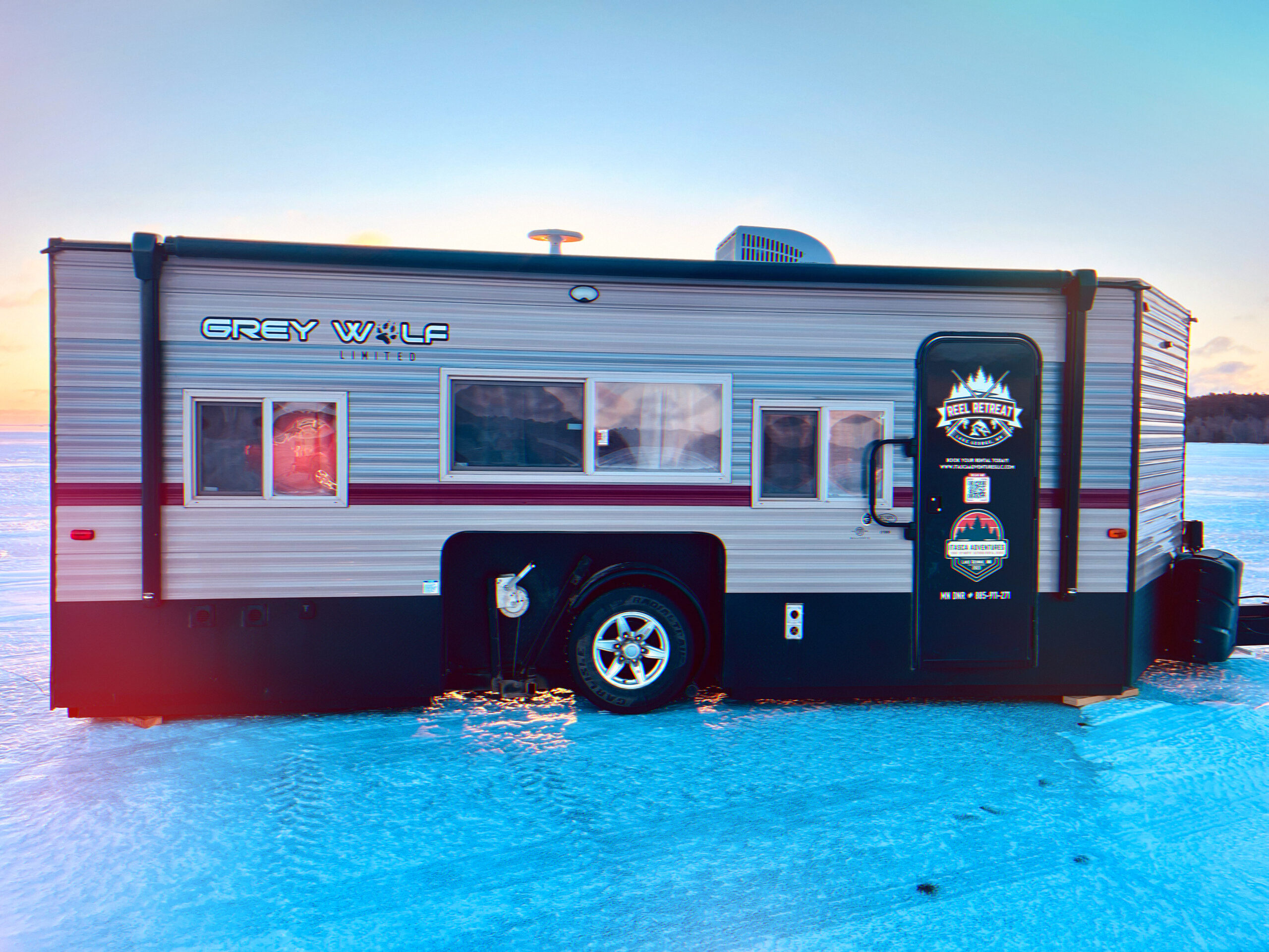 Photo of an ice house or wheelhouse sitting on Leech Lake in the winter for ice fishing. This ice house is available for rent in northern Minnesota near the cities of Walker, Park Rapids, Nevis, and Bemidji